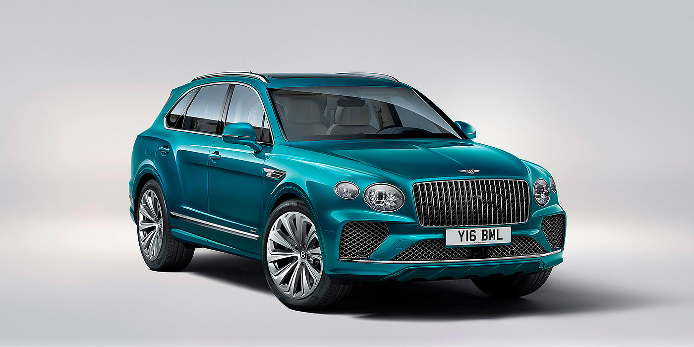 Bentley Gold Coast (Australia) Bentley Bentayga Azure front three-quarter view, featuring a fluted chrome grille with a matrix lower grille and chrome accents in Topaz blue paint.