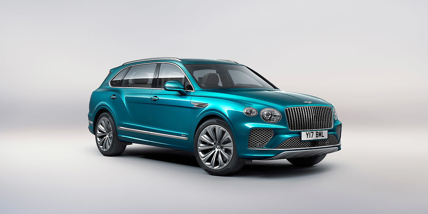 Bentley Gold Coast (Australia) Bentley Bentayga EWB Azure front three-quarter view, featuring a fluted chrome grille with a matrix lower grille and chrome accents in Topaz blue paint.