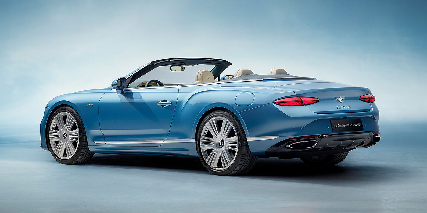 Bentley Gold Coast (Australia) New Bentley Continental GTC Azure convertible rear view in Light Windsor blue paint with 22 inch ten spoke wheels and chrome exterior details