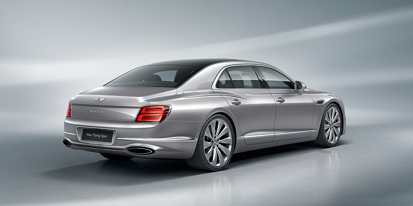 Bentley Gold Coast (Australia) New Bentley Flying Spur sedan rear view in Silverlake paint with ten spoke wheels and chrome matrix grille