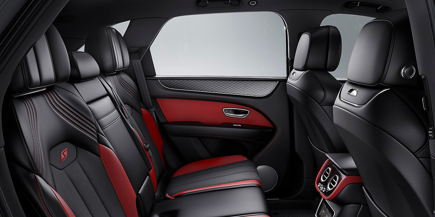 Bentley Gold Coast (Australia) Bentey Bentayga S interior view for rear passengers with Beluga black and Hotspur red coloured hide.