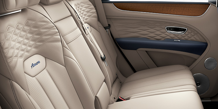 Bentley Gold Coast (Australia) Bentley Bentayga Azure SUV rear interior in Portland and Imperial Blue hides and seat stitching featuring Azure seat emblem