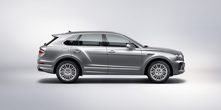Bentley Gold Coast (Australia) Bentley Bentayga SUV side profile in Moonbeam silver paint against white background featuring 21 inch 5 spoke wheels