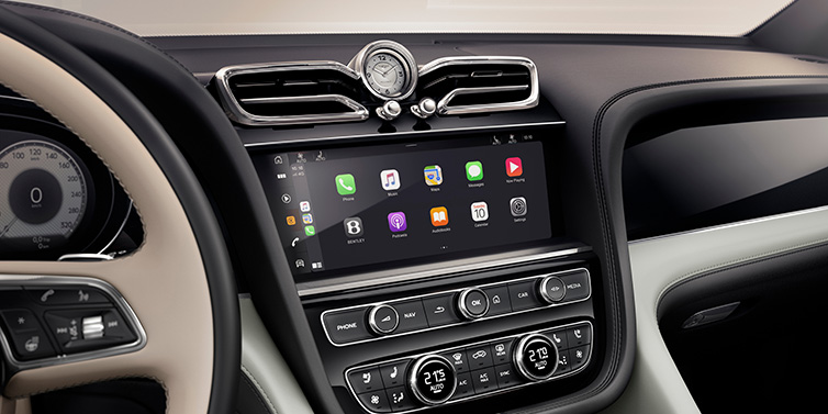 Bentley Gold Coast (Australia) Bentley Bentayga Extended Wheelbase Mulliner SUV front interior centre console with MMI screen showing Apps surrounded by Linen and Beluga black hide